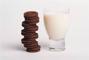 A large snack of cookies and milk