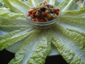 Serve in a small bowl surrounded by lettuce leaves 