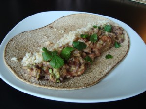 Put mixture, rice, cilantro, and lime juice on wrap